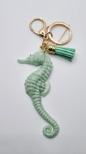 Load image into Gallery viewer, Sparkly Resin Seahorse Tassel Keychains
