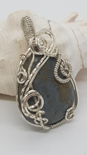 Load image into Gallery viewer, Silver Swirly Tumbled Blue Beach Stone Pendant