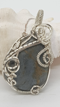 Load image into Gallery viewer, Silver Swirly Tumbled Blue Beach Stone Pendant