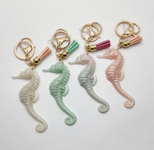 Load image into Gallery viewer, Sparkly Resin Seahorse Tassel Keychains
