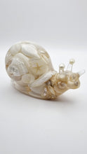 Load image into Gallery viewer, Handcrafted Resin Snail Figurine Featuring White Seashells
