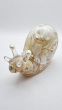 Load image into Gallery viewer, Handcrafted Resin Snail Figurine Featuring White Seashells
