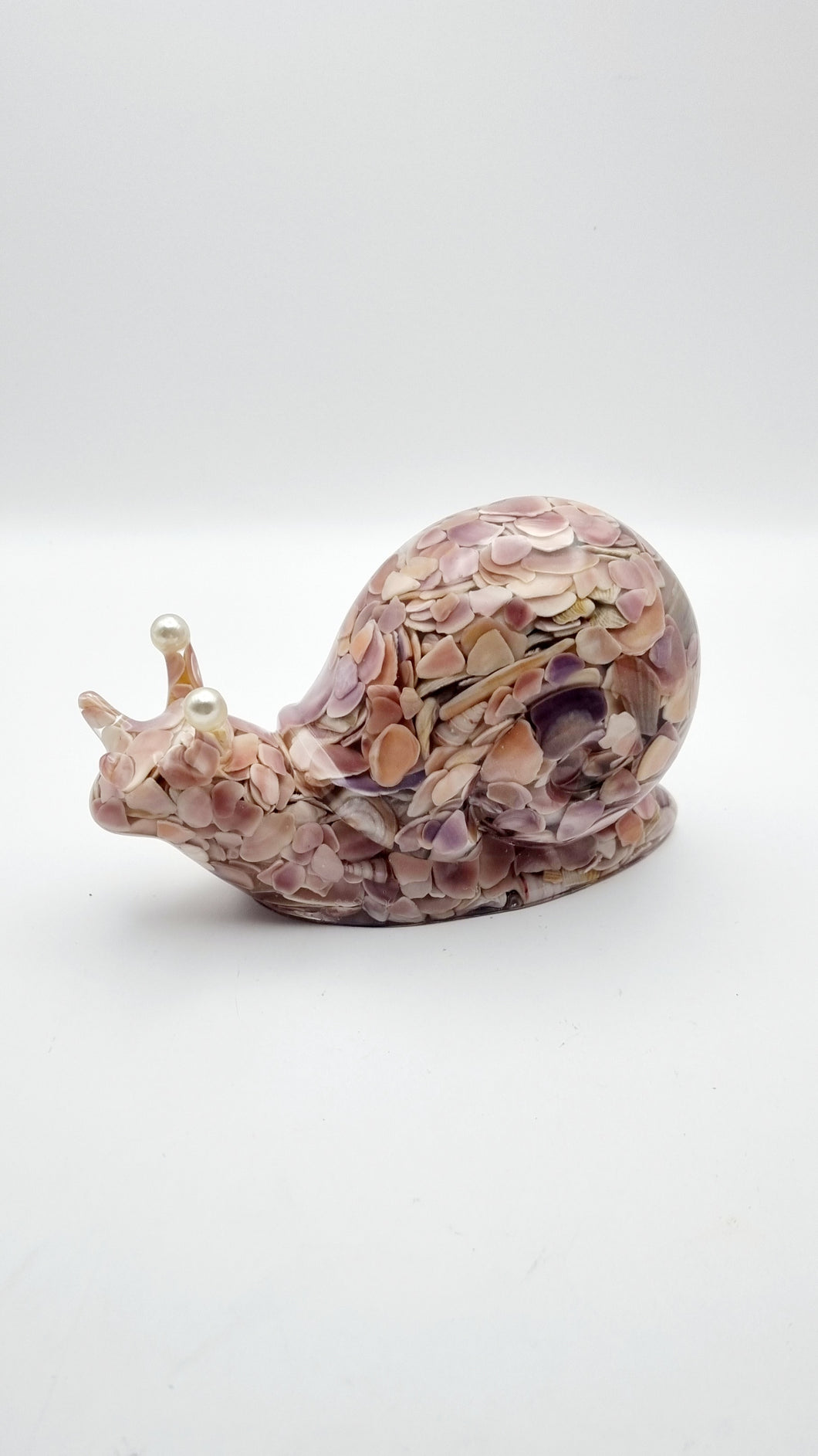 Handcrafted Resin Snail Figurine Featuring Pink Seashells