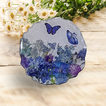 Load image into Gallery viewer, Gorgeous Sparkly Geode Resin Coasters Featuring Flowers &amp; Butterflies in Blue &amp; Purple Hues
