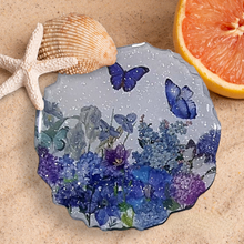 Load image into Gallery viewer, Gorgeous Sparkly Geode Resin Coasters Featuring Flowers &amp; Butterflies in Blue &amp; Purple Hues
