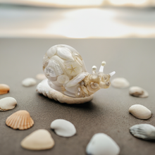 Load image into Gallery viewer, Handcrafted Resin Snail Figurine Featuring White Seashells
