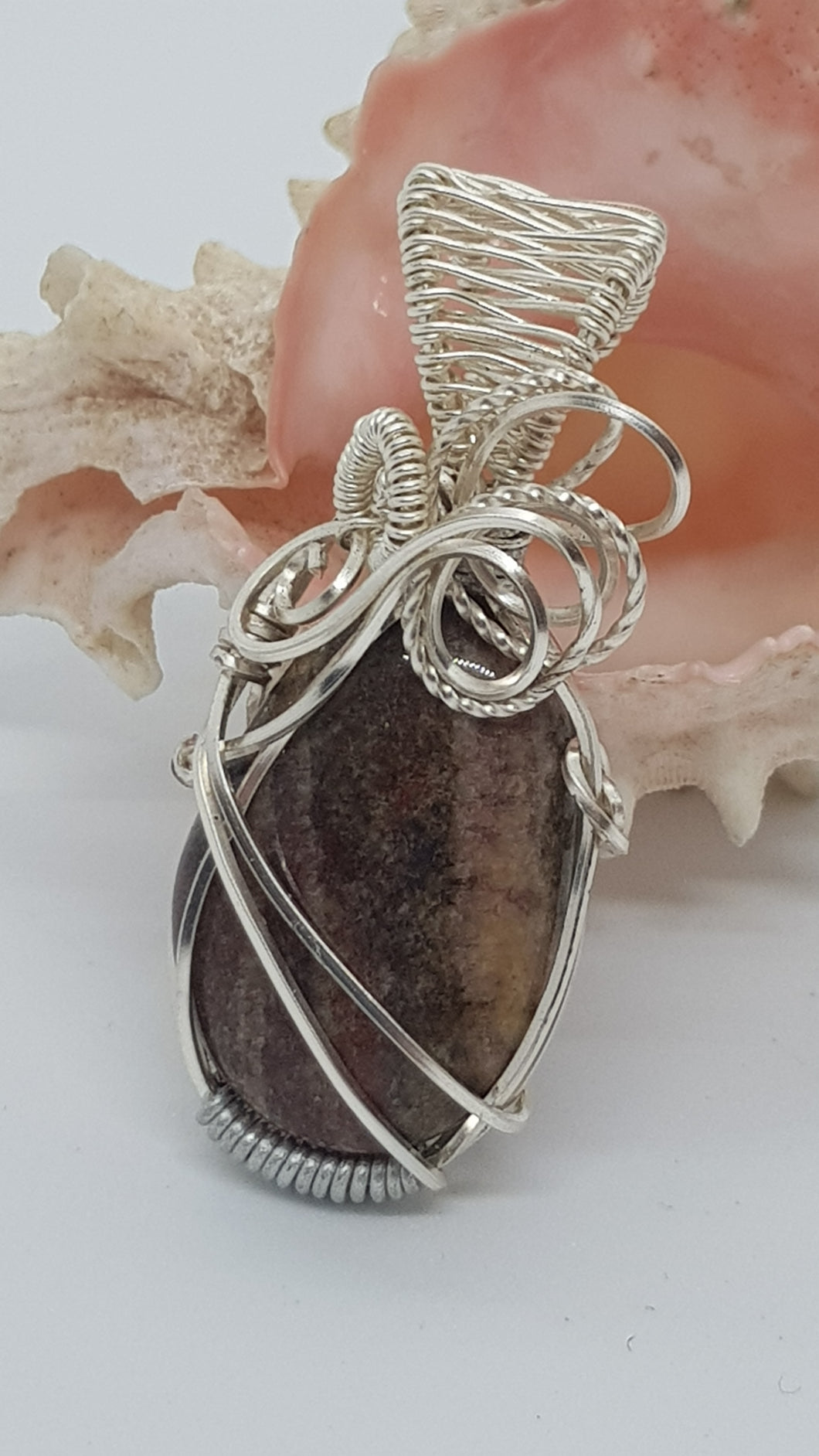 Silver Swirl Woven Brown Tumbled Beach Stone Pendant