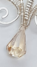 Load image into Gallery viewer, Handcrafted Silver Wire Wrapped Woven Love Heart Pendant Featuring A Faceted Crystal Bead
