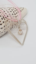 Load image into Gallery viewer, Handcrafted Silver Wire Wrapped Woven Love Heart Pendant Featuring A Faceted Crystal Bead
